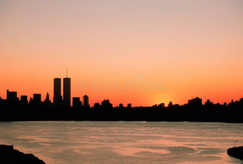 New York skyline at sunset before 9-11 showing world trade center towers, taken from Brooklyn. New York skyline at sunset before 9-11 showing world trade center towers, taken from Brooklyn