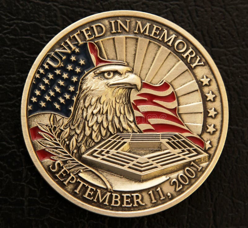 A commemorative coin of the events that shook the world, the September 11, 2001 or 9/11 bombing in New York City and Washington, DC. The coin has a face of a bald eagle with a waving US or American flag in the background and the symbol of the Pentagon building in front with the date of the event inscripted at the bottom. A commemorative coin of the events that shook the world, the September 11, 2001 or 9/11 bombing in New York City and Washington, DC. The coin has a face of a bald eagle with a waving US or American flag in the background and the symbol of the Pentagon building in front with the date of the event inscripted at the bottom.