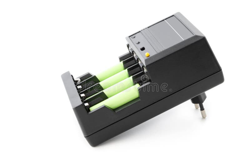AAA batteries rechargeable in accumulator charger stock photos