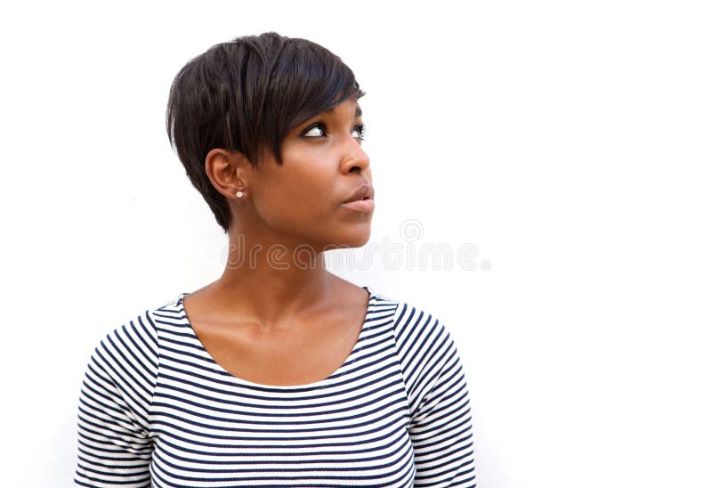 Close up portrait of an attractive young african american woman looking away. Close up portrait of an attractive young african american woman looking away