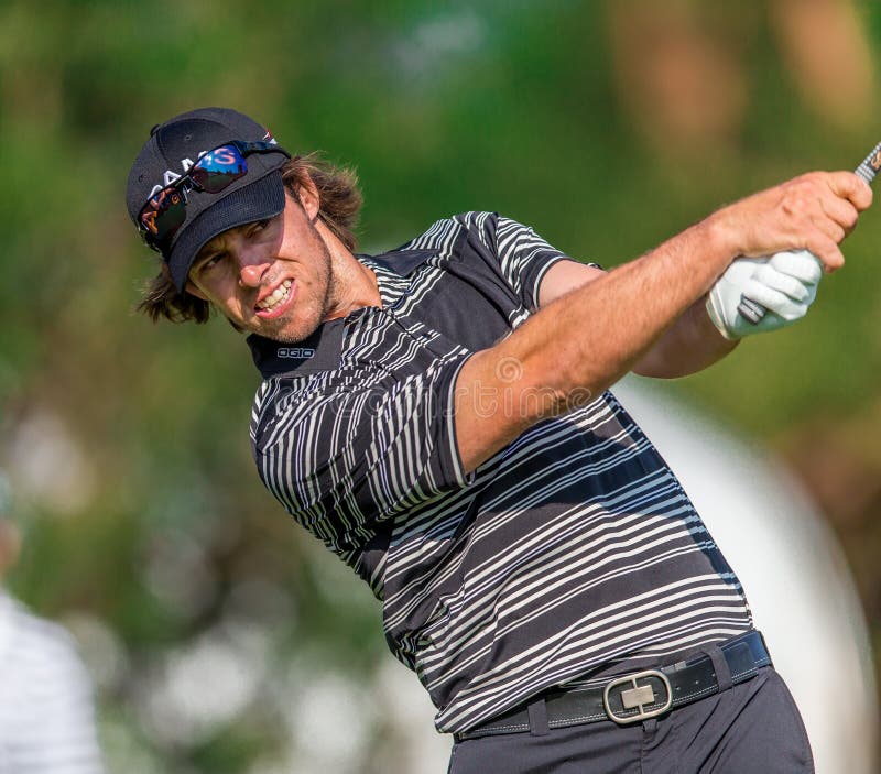 ARDMORE, PA - June 12: Aaron Baddeley hits a drive at the 2013 US Open at Merion on June 12, 2013 in Ardmore, PA. ARDMORE, PA - June 12: Aaron Baddeley hits a drive at the 2013 US Open at Merion on June 12, 2013 in Ardmore, PA.