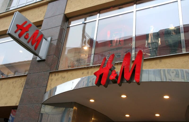 Monday, December 15, 2008. H&M Hennes & Mauritz AB logo and firm is displayed at the company's shop, in Wien (Vienna), Austria. Monday, December 15, 2008. H&M Hennes & Mauritz AB logo and firm is displayed at the company's shop, in Wien (Vienna), Austria.