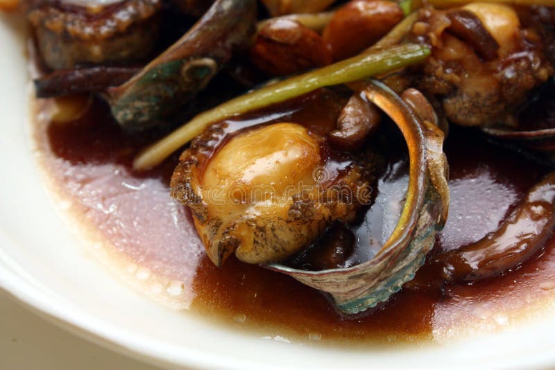 Abalone Dish at Restaurant stock image. Image of dinner 15495143