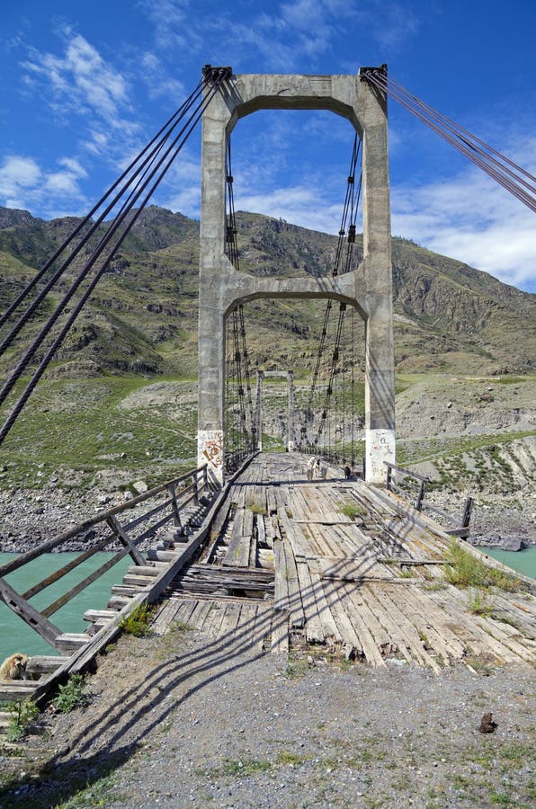 Abandoned bridge over the river Katun, Altai, Russia.