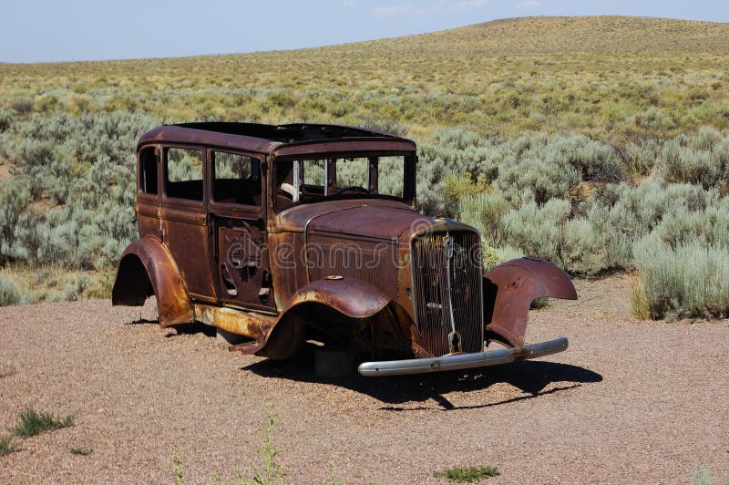 Abandoned car wreck in the desert