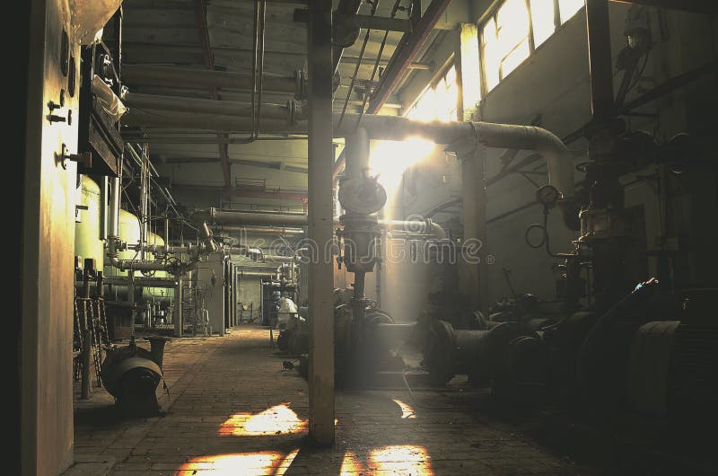 Abandoned, vintage factory building in the morning sunlight