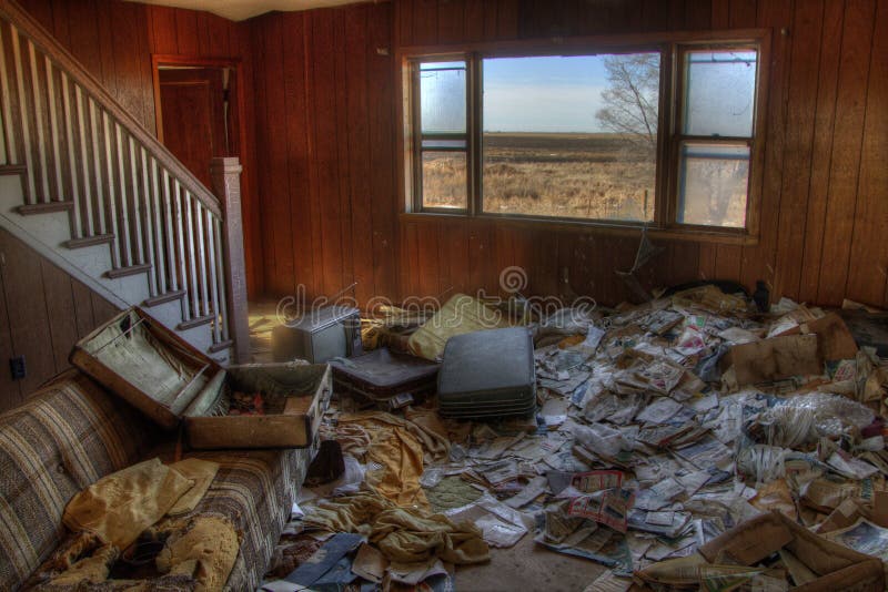 An Abandoned Farm House in Rural South Dakota Agricultural Country loses against to the Elements