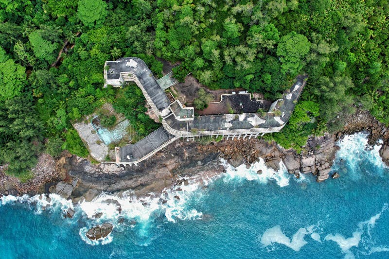 Abandoned hotel complex on the island of Mahé in the Seychelles. Nature is slowly taking back the hotel on the island of Mahé in the Seychelles. Seychelles stock images, royalty-free photos and pictures