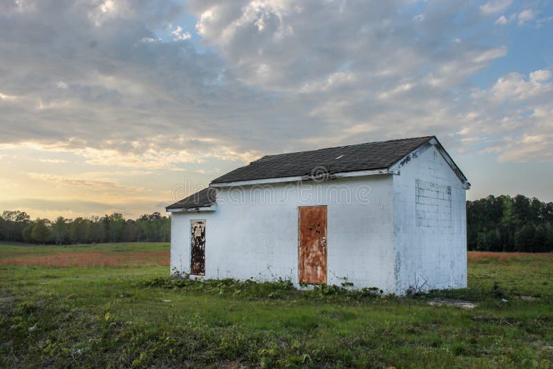 Abandoned House In A Random Field In Front Of A Sunset Stock Photo Are Outhouses Legal In North Carolina