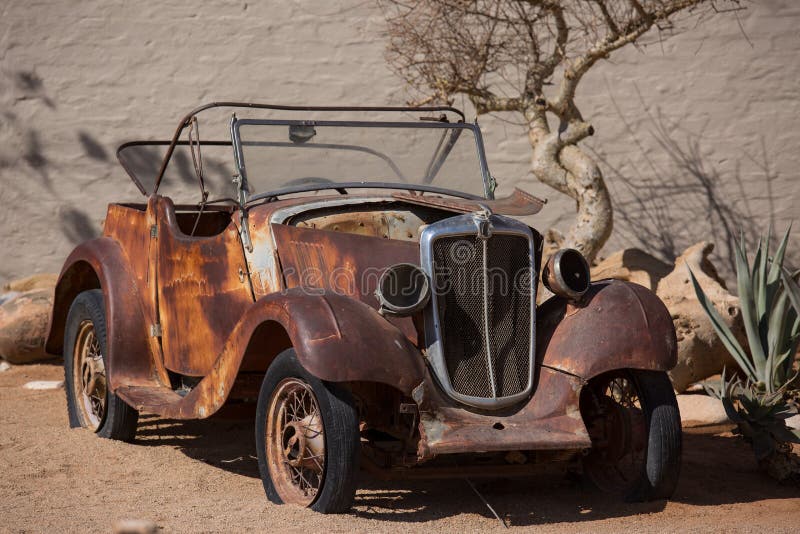 Solitaire, Namibia-03 Sep 2019: abandoned old rusty wrecked historic cars near a service station at Solitaire in Namibia