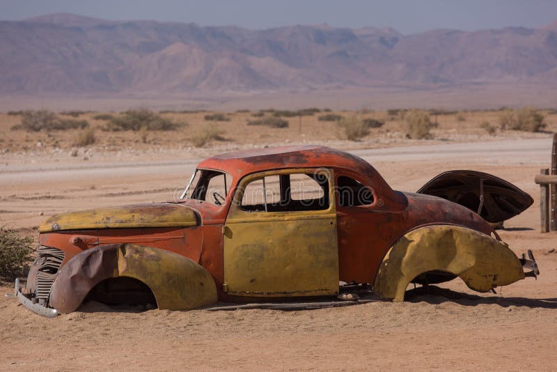Solitaire, Namibia-03 Sep 2019: abandoned old rusty wrecked historic cars near a service station at Solitaire in Namibia