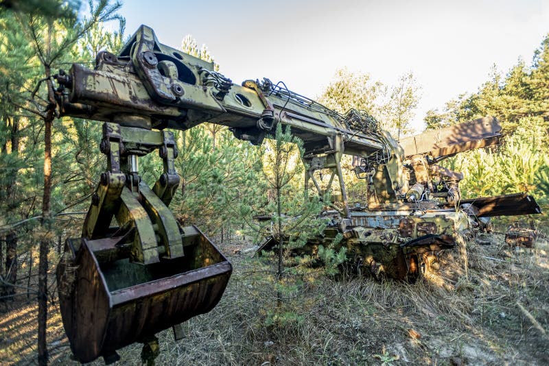 Abandoned radioactive technik that participated in the liquidation of the accident stock photos