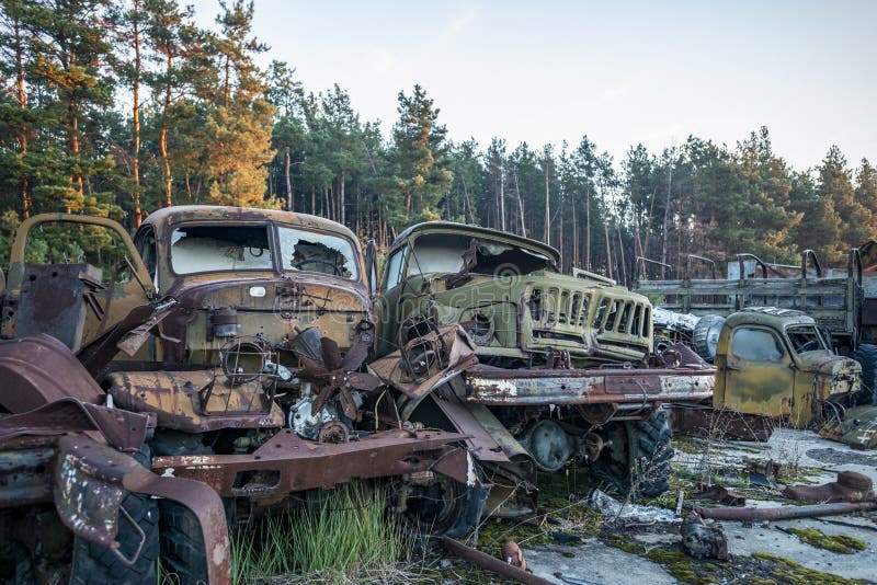 Abandoned radioactive technik that participated in the liquidation of the accident stock photos