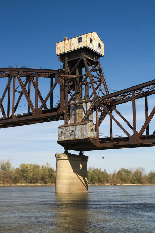 Abandoned railway bridge over a river