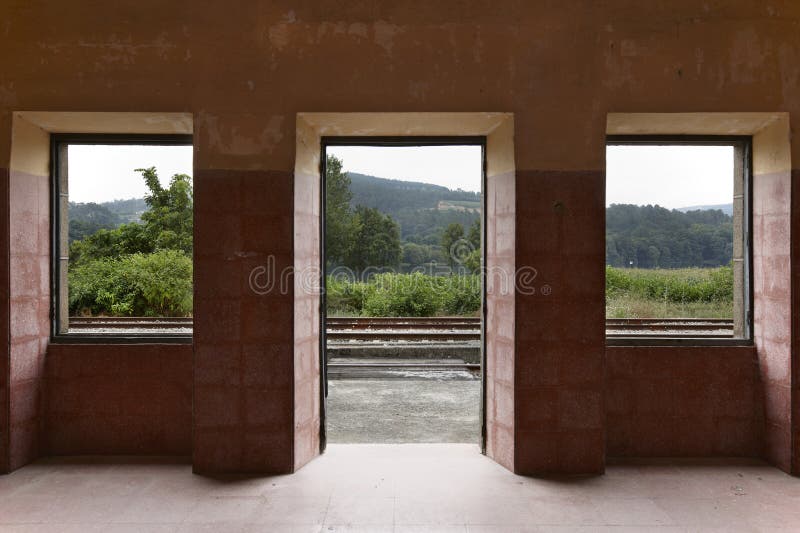 Abandoned railway station and train rails stock photos