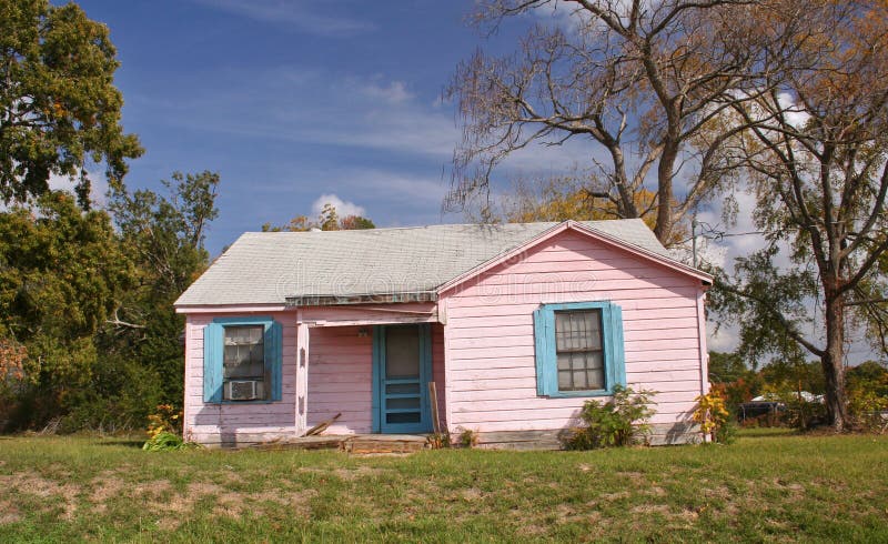 Abandoned Small Pink House in Rural Countryside royalty free stock image