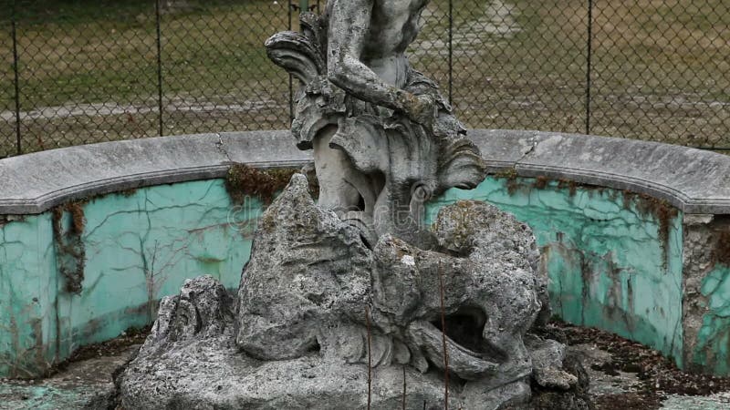 Abandoned statue in neglected city