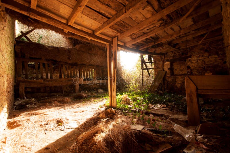 Abandoned traditional old stone French cow barn