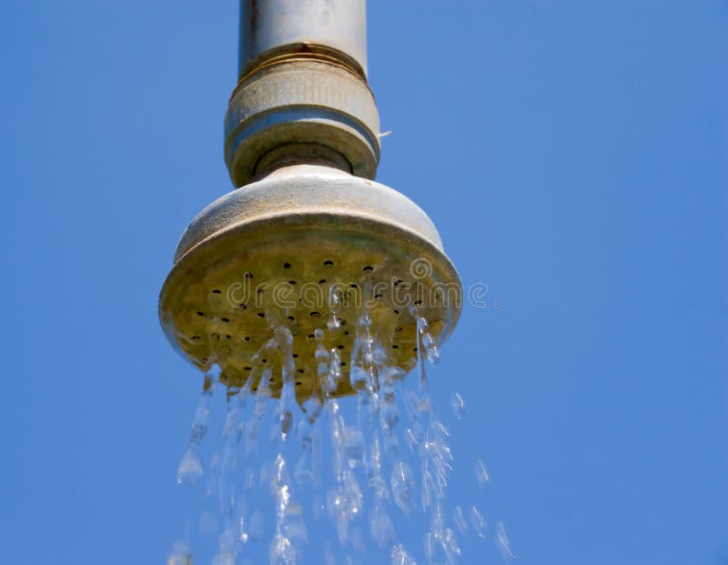 Closeup photograph of a worn water supply outlet. Closeup photograph of a worn water supply outlet.