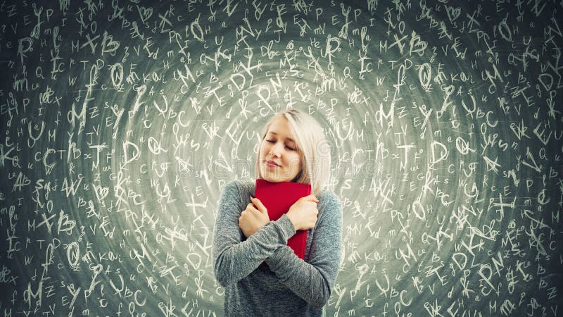 Young woman student holding a red book to chest with closed eyes. A warm hug show the love for knowledge and different letters flying around. Hypnotic power of literature and education. Young woman student holding a red book to chest with closed eyes. A warm hug show the love for knowledge and different letters flying around. Hypnotic power of literature and education.