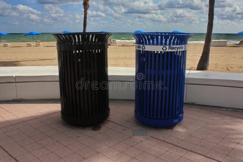 Trash and recycle cans at beach in south Florida. Trash and recycle cans at beach in south Florida.