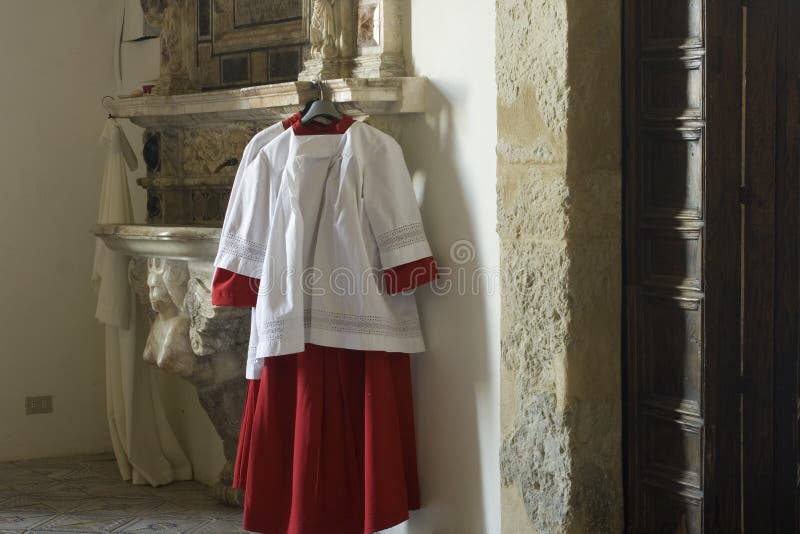 Abito talare per il chierichetto fotografia stock Abito talare per il chierichetto fotografia stock
