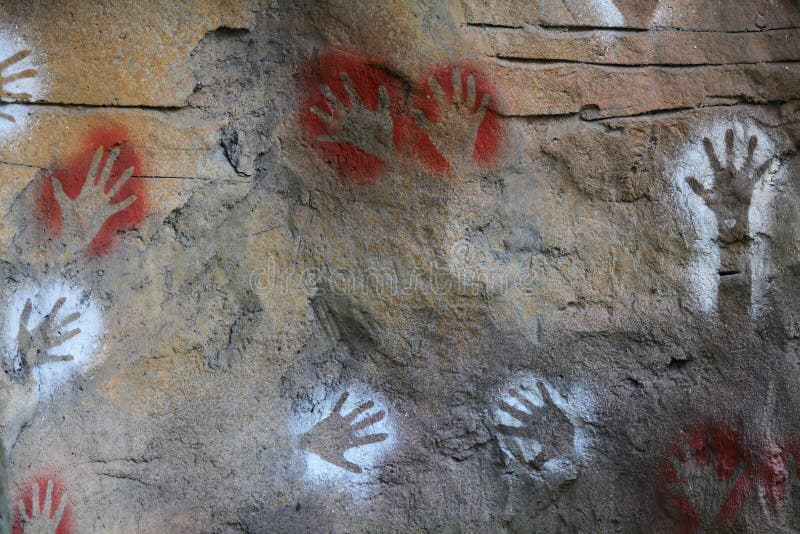 Aborygen sztuki ręki na kamiennej ścianie