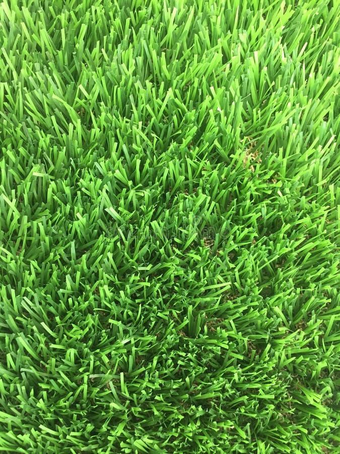 An Above View of Close Up of Fake Grass Showing the Many Plastic Grass