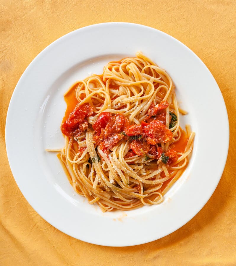 Above view of spaghetti with tomato sauce