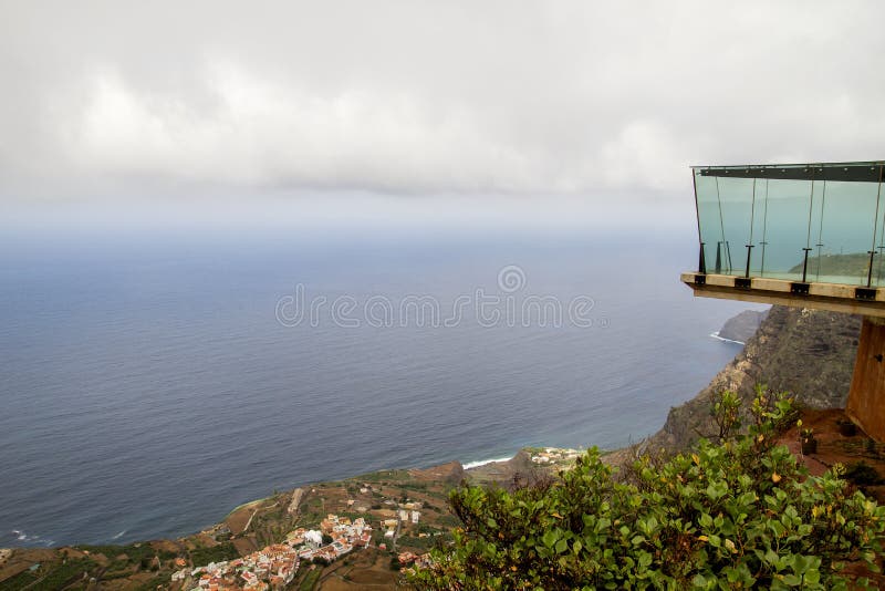 Abrante viewpoint in La Gomera. Glass walkway in Mirador de Abrante, La Gomera, Canary Islands, Spain stock photo Abrante viewpoint in La Gomera. Glass walkway in Mirador de Abrante, La Gomera, Canary Islands, Spain stock photo