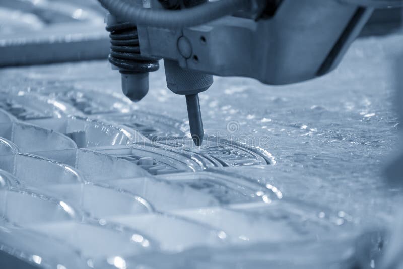 The Abrasive Water Jet Machine Cutting the Metal Plate. Stock Photo