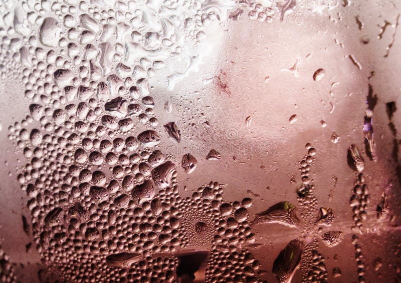 Abschluss herauf abstrakte Wasser-Tropfen auf einem Glashintergrund lizenzfreie stockfotografie Abschluss herauf abstrakte Wasser-Tropfen auf einem Glashintergrund lizenzfreie stockfotografie