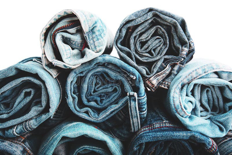 Abschluss rollte oben von den Blue Jeans-Hosen, die dunkelblaue Denimhose, die Beschaffenheit auf Weiß zeigt lizenzfreies stockbild Abschluss rollte oben von den Blue Jeans-Hosen, die dunkelblaue Denimhose, die Beschaffenheit auf Weiß zeigt lizenzfreies stockbild