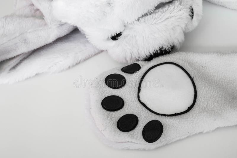 Abstract animal paw, part of clothes royalty free stock images