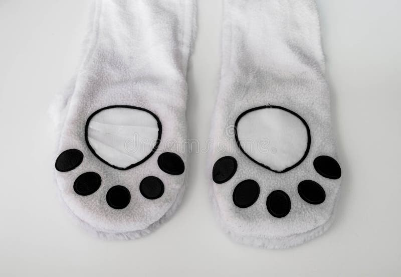 Abstract animal paw, part of clothes stock images