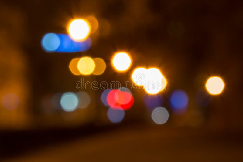 Abstract background of blurred lights with bokeh effect