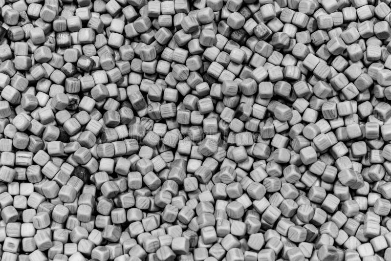 An array of small pale gray cubes. Abstract background created with an array of small pale gray cubes forming a rough irregular, textured surface An array of small pale gray cubes. Abstract background created with an array of small pale gray cubes forming a rough irregular, textured surface