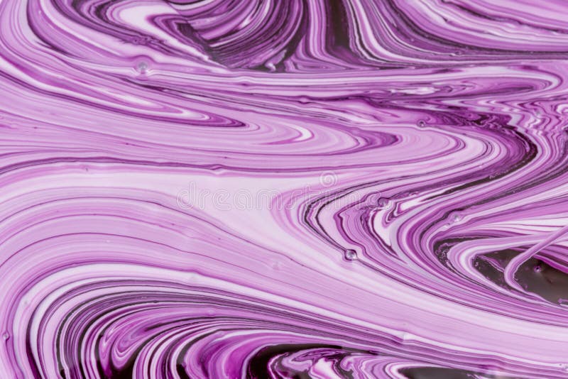 Abstract background for layouts. Unusual patterns close-up when mixing white and violet paint. Bright photo.