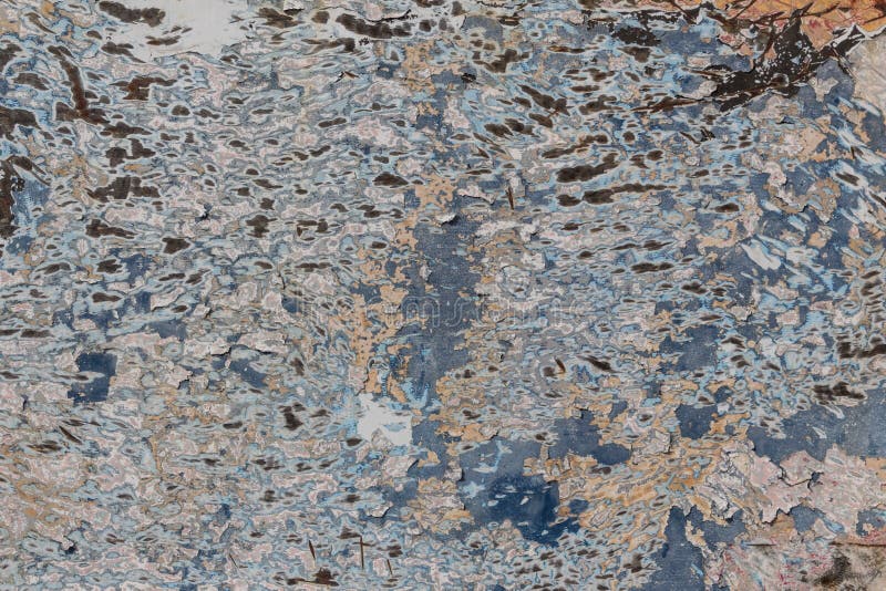 Abstract background of multiple layers of paint with scratches and peeling stock photo