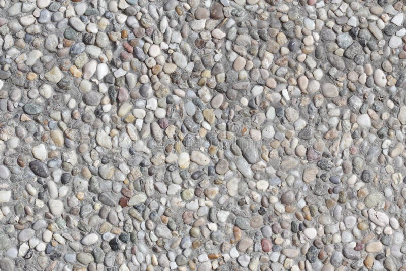 Abstract background paving consisting of small pebbles stock photography