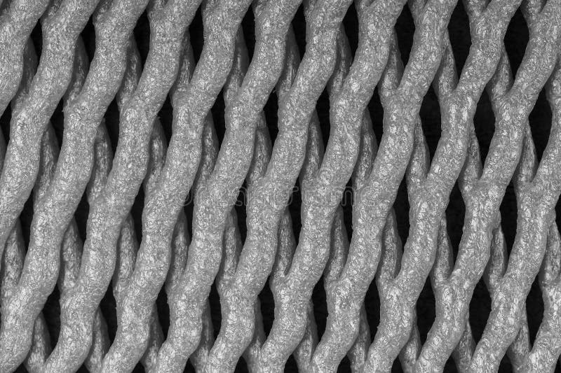 Abstract background of plastic mesh texture for fruit storage, black and white stock photo