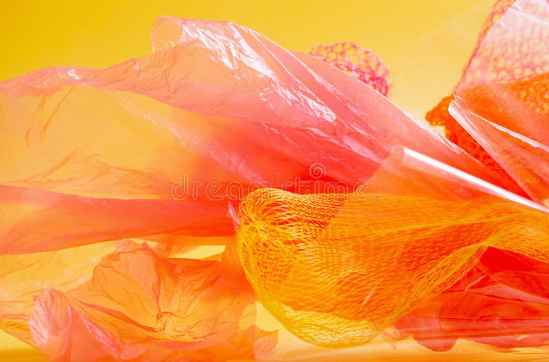 The Abstract Background of Red and Yellow Plastic Bags Stock Photo
