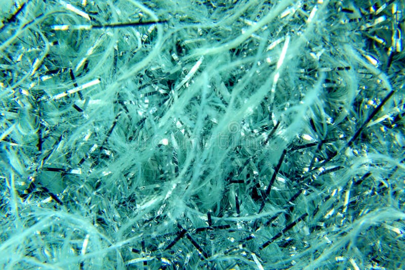 Abstract Background of Shiny Blue and White Tinsel and Glitter Stock