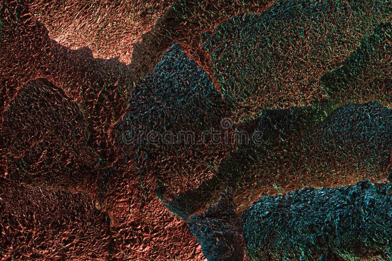Abstract background of silver textured ragged foil with colorful illumination. royalty free stock image