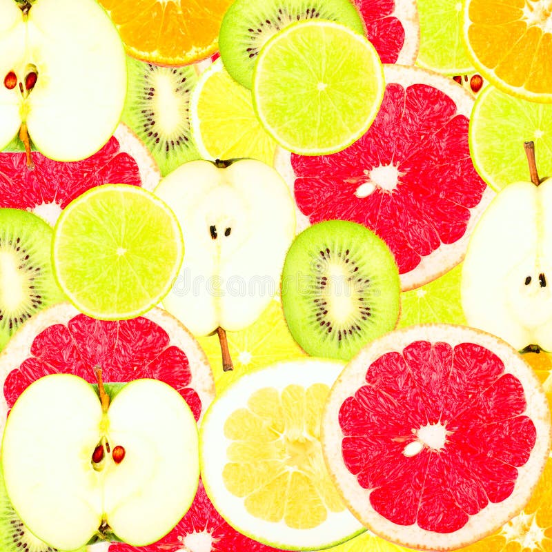 Abstract background with slices of fresh fruits. Seamless pattern for a design. Close-up. Studio photography.