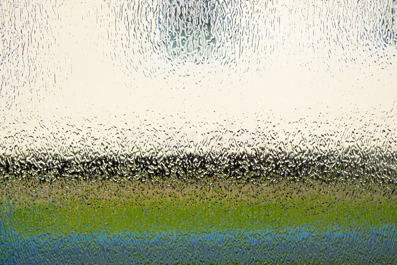 Abstract background taken through patterned glass royalty free stock photo