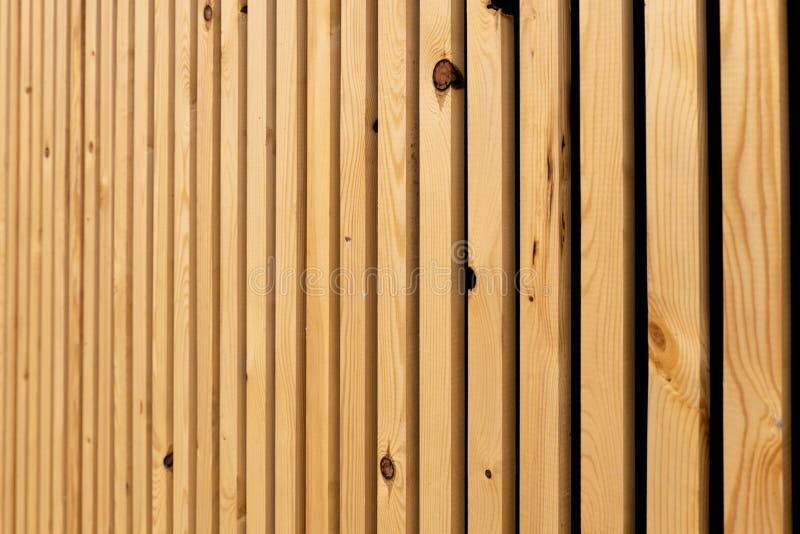 Abstract Background of Wooden Strips. Vertical Fence of Wooden Slats