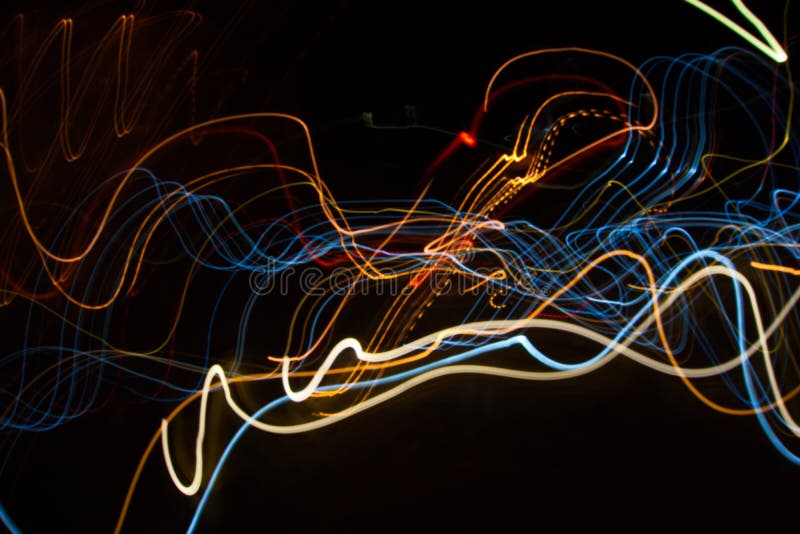 Abstract beautiful light painting photography, waves abstract light on black background stock image Abstract beautiful light painting photography, waves abstract light on black background stock image