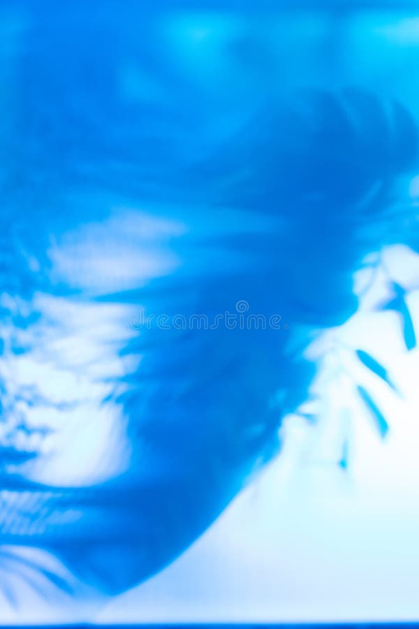 Abstract blue background with blurred motion effect, suggesting movement and energy. Perfect for design projects needing a dynamic royalty free illustration