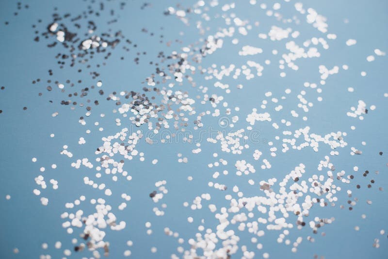 Abstract Blue Background with Silver Confetti Close Up. Stock Image